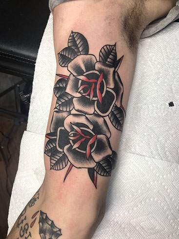 traditional-black-and-grey-flowers-tattoo